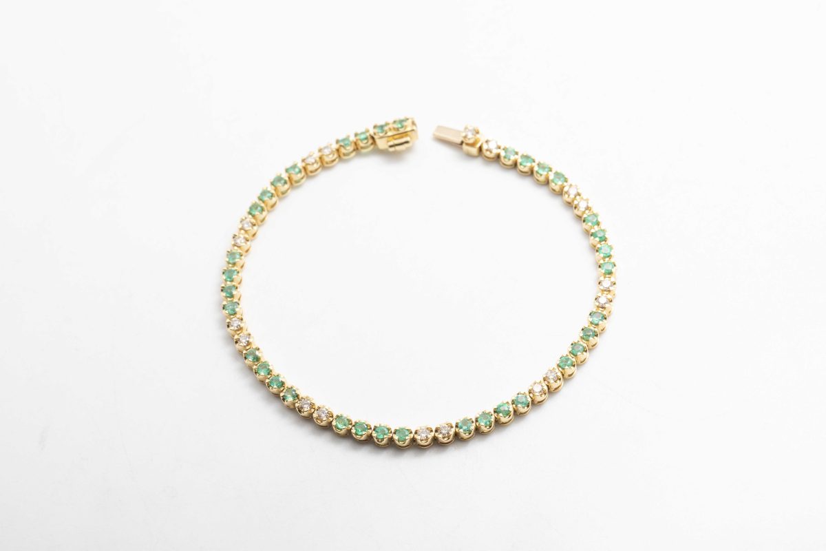 Pulsera tennis con esmeraldas y diamatnes