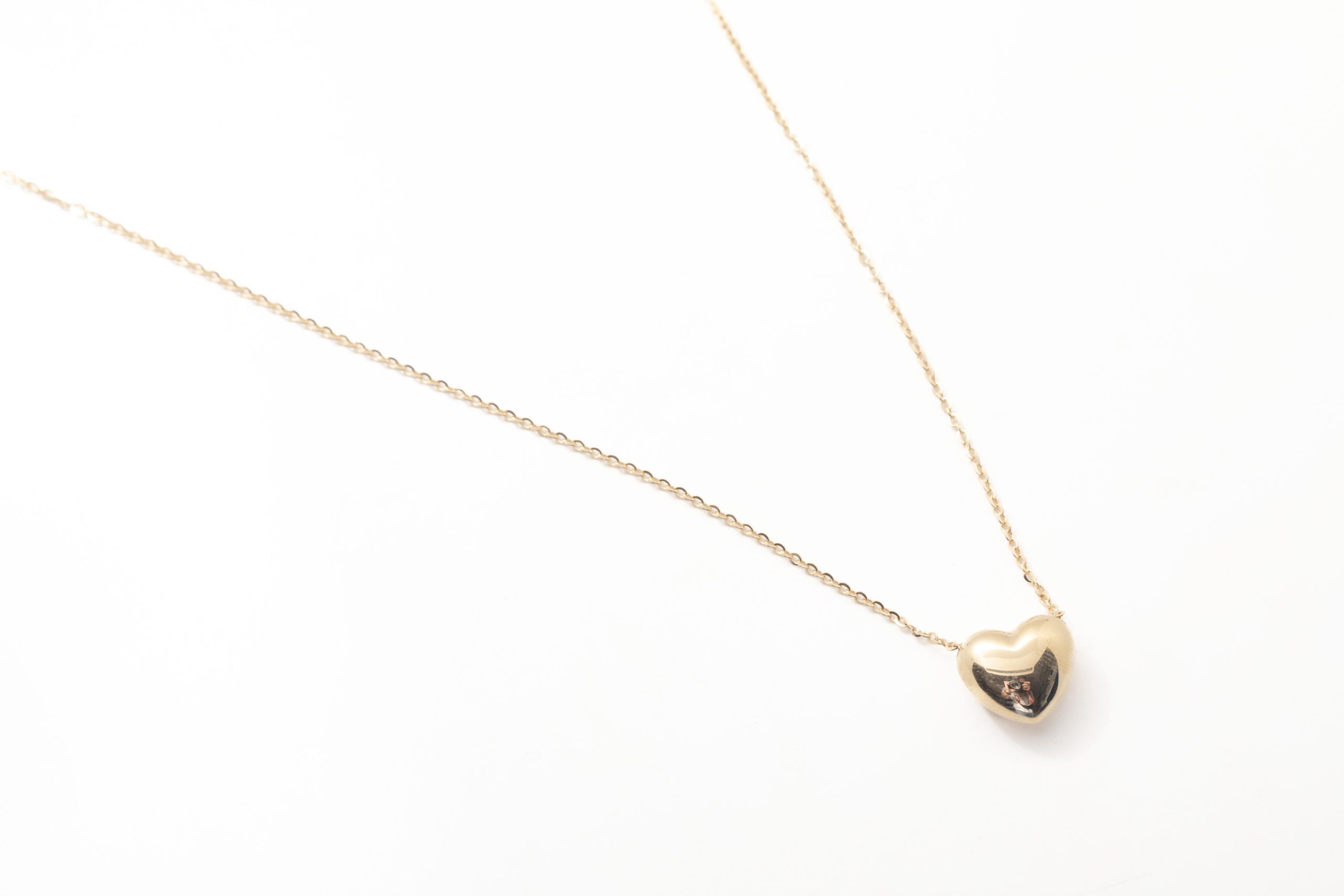 Collar con corazón inflado